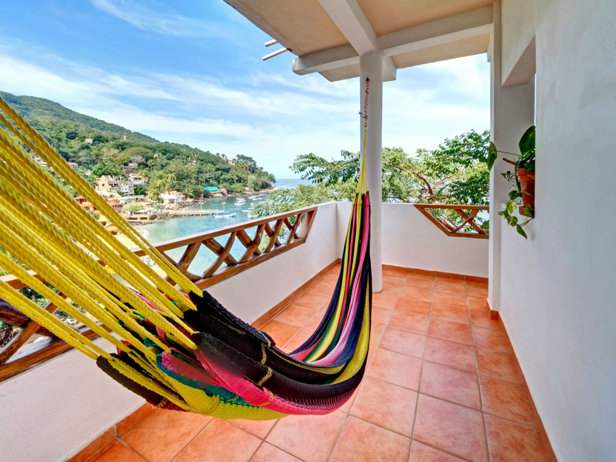 hammock overlooking the ocean in this vacation rental in mexico