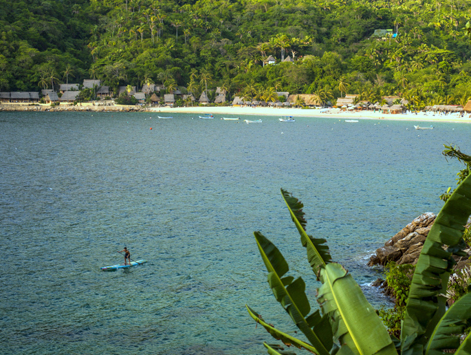 paddle boarding in the water in Yelapa