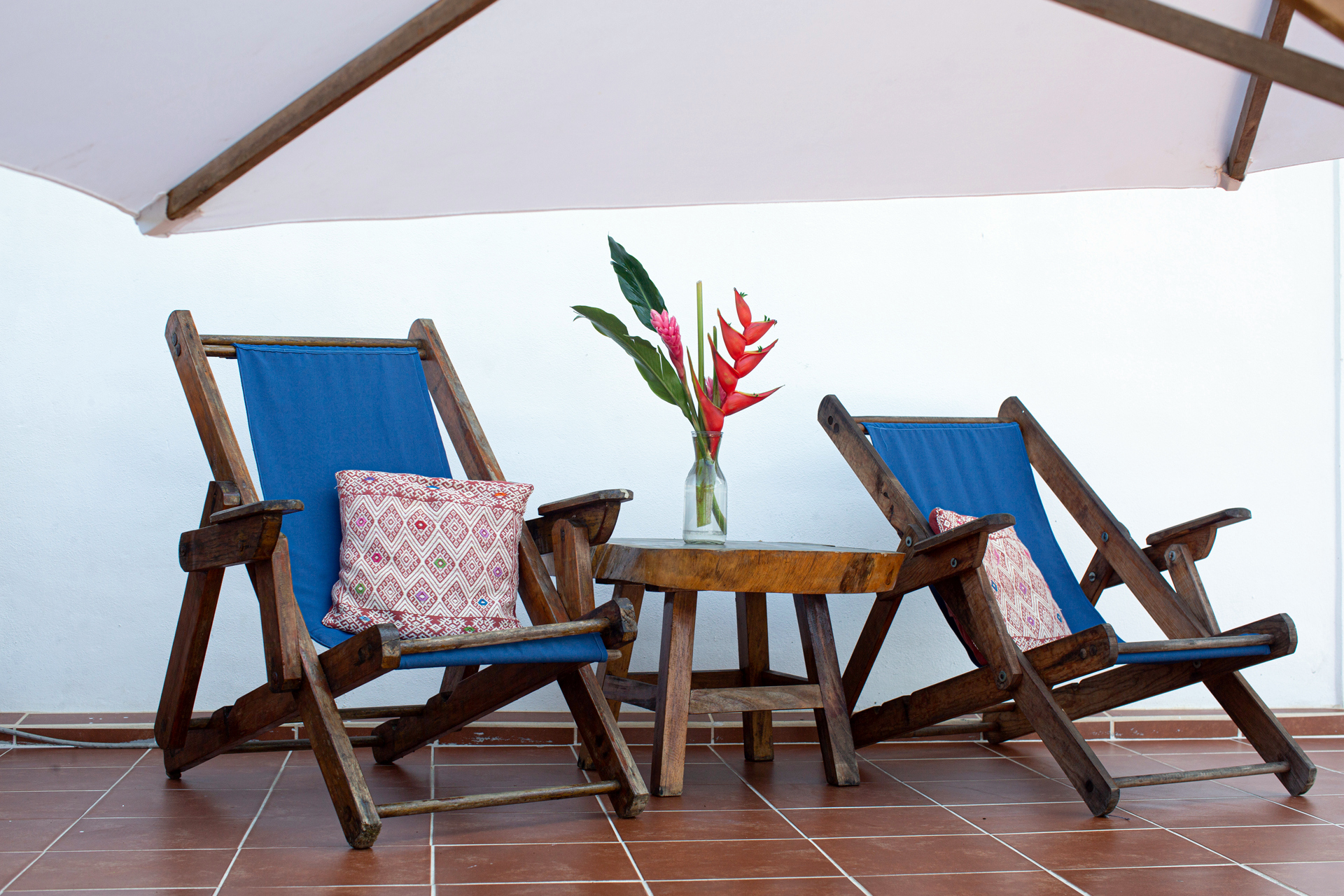 beach chairs on the balcony of casa palmita